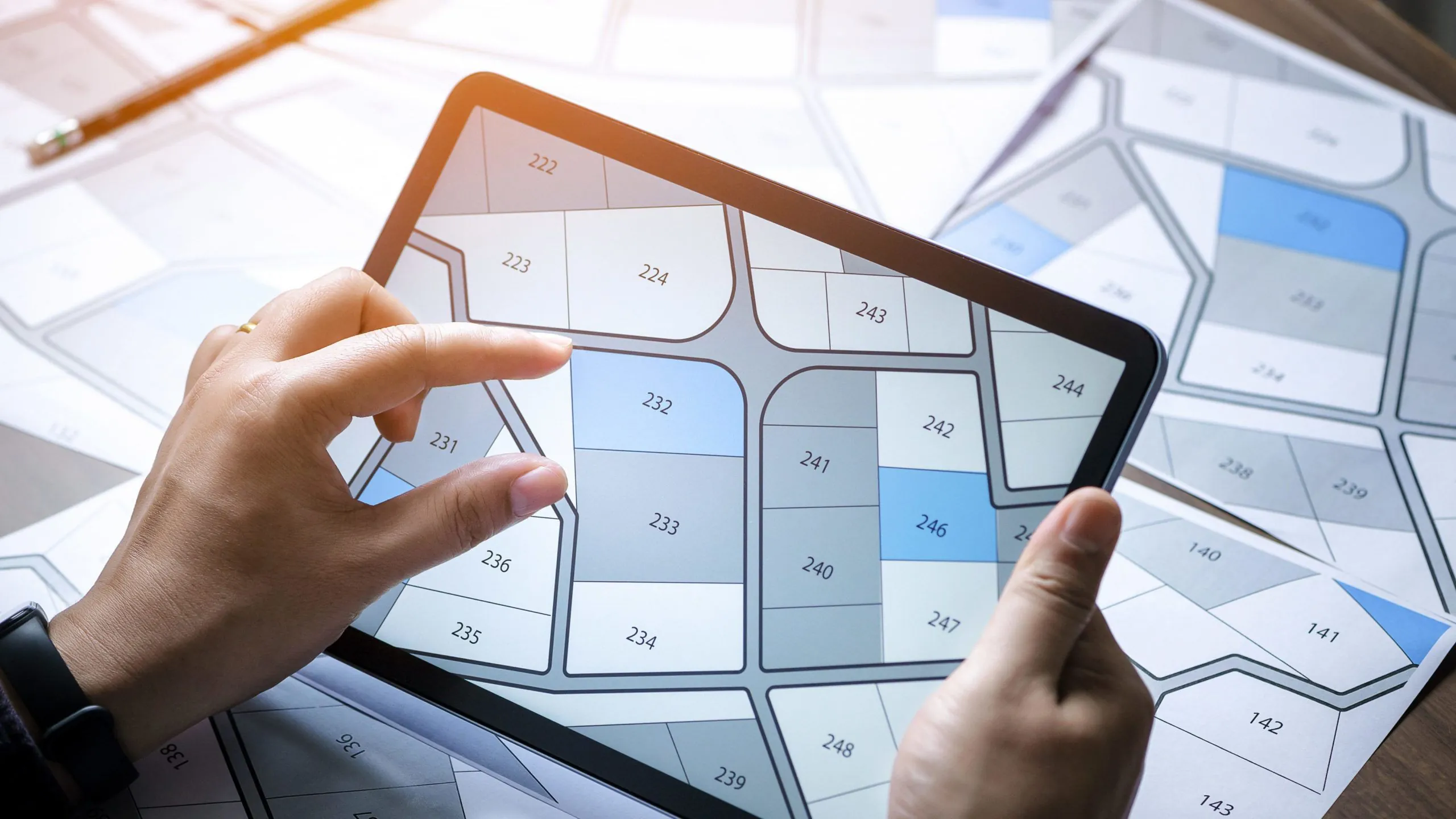 Real Estate Property Map Examination Analyzing property boundaries and details on a digital map.