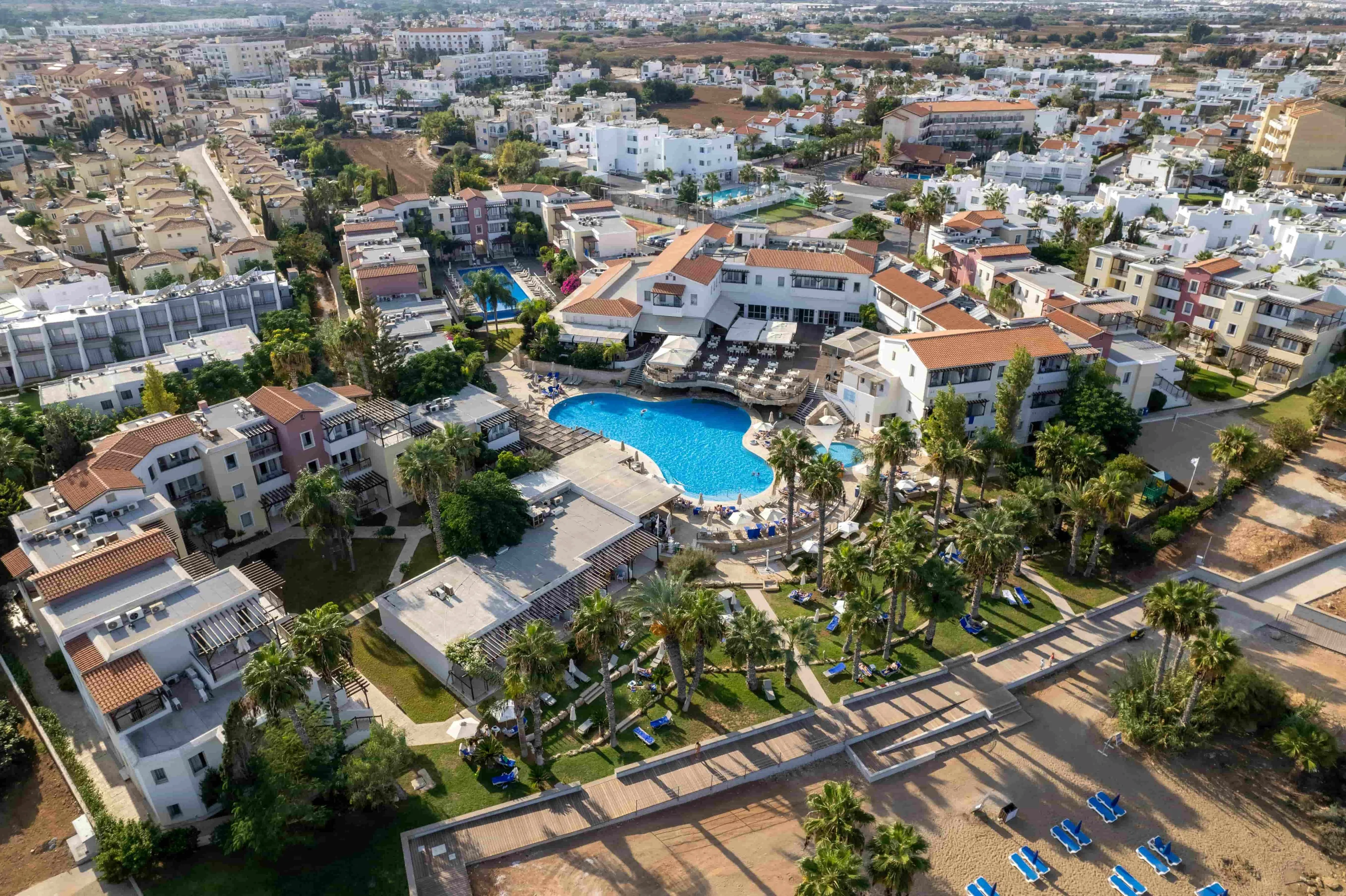 Protaras is a lively coastal town Aerial View a Swimming Pool in a Resort
