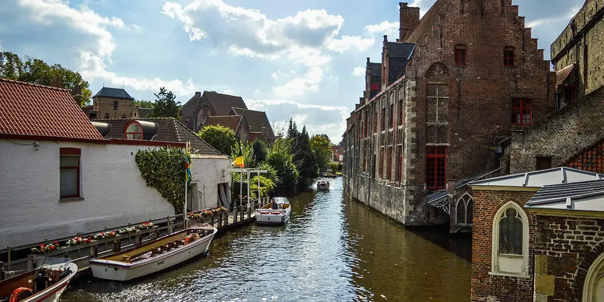 Boats on a canal in the historic town of Bruges, Belgium.