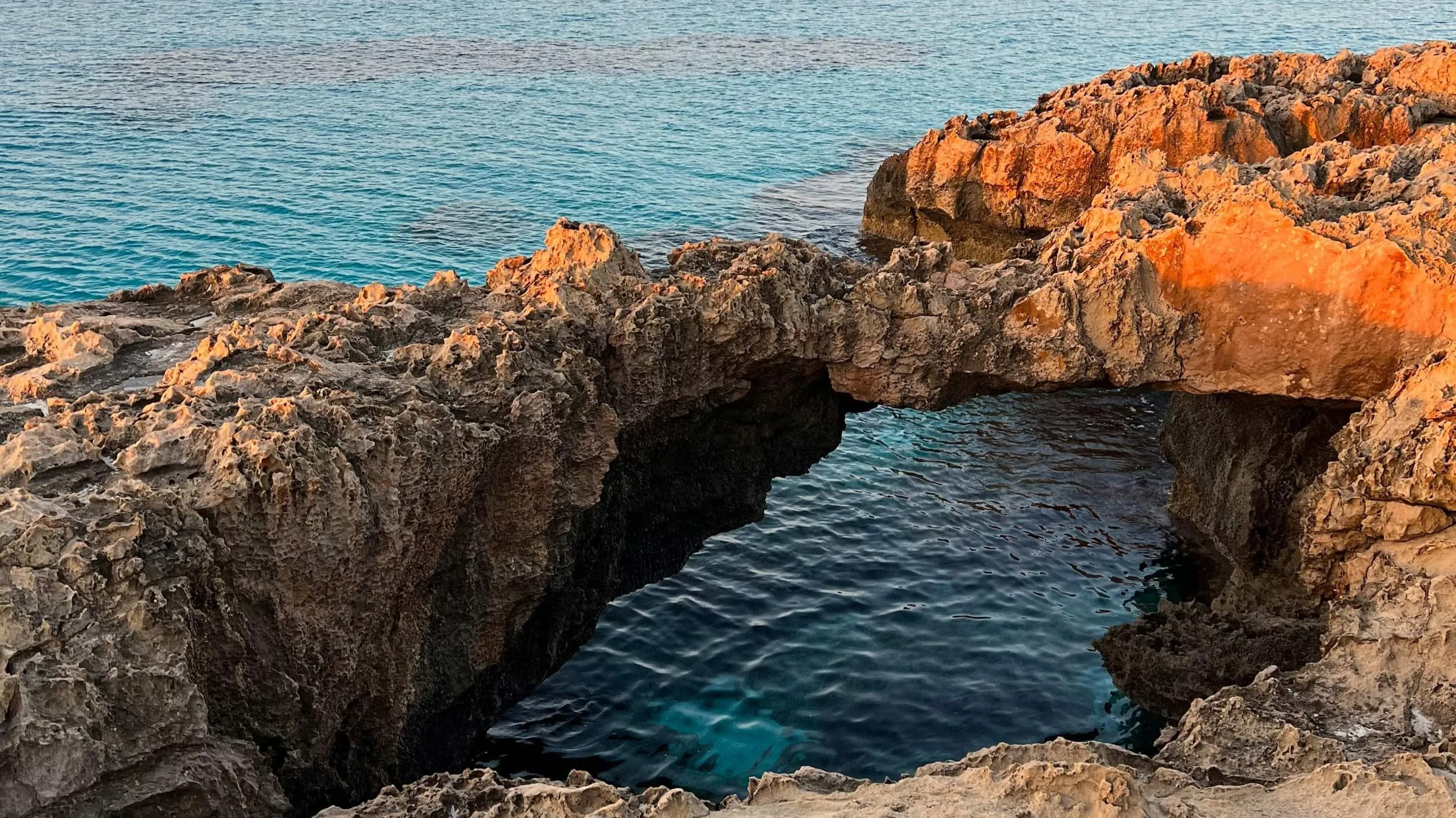 Rock Formation by Sea at Dawn