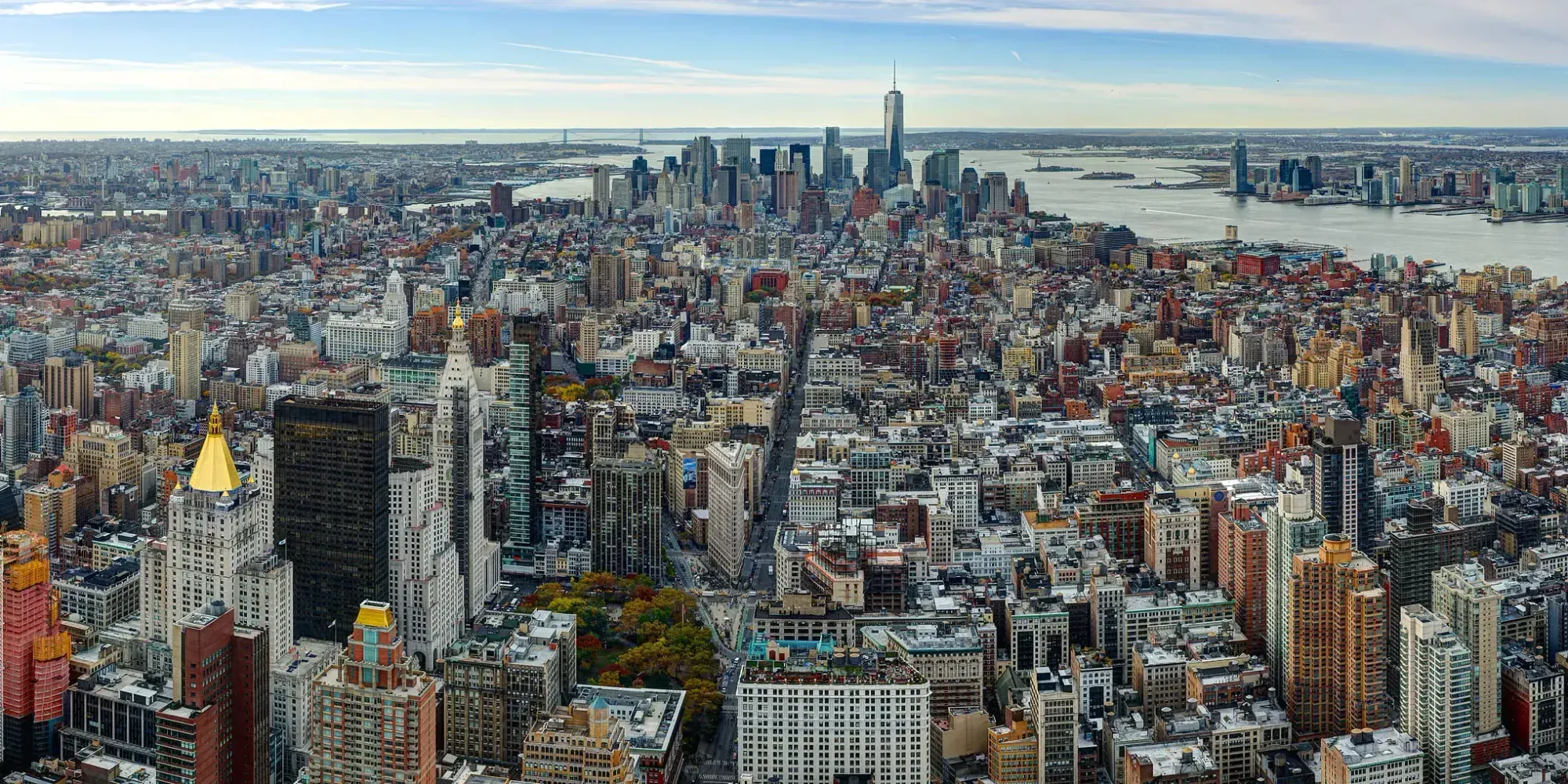 Panoramic view of Lower Manhattan and One World Trade Center from the top of the Empire State Building in New York City
