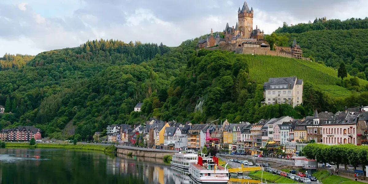 Castle on a hill above a village and river in Cochem, Germany.