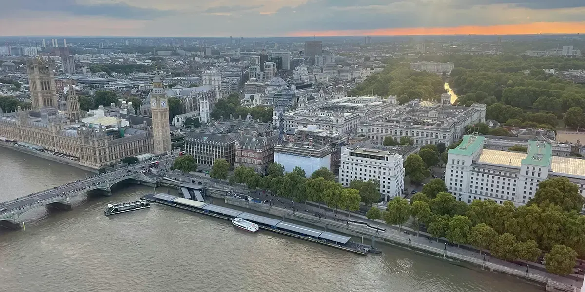 Aerial view of Westminster and the Thames at sunset.