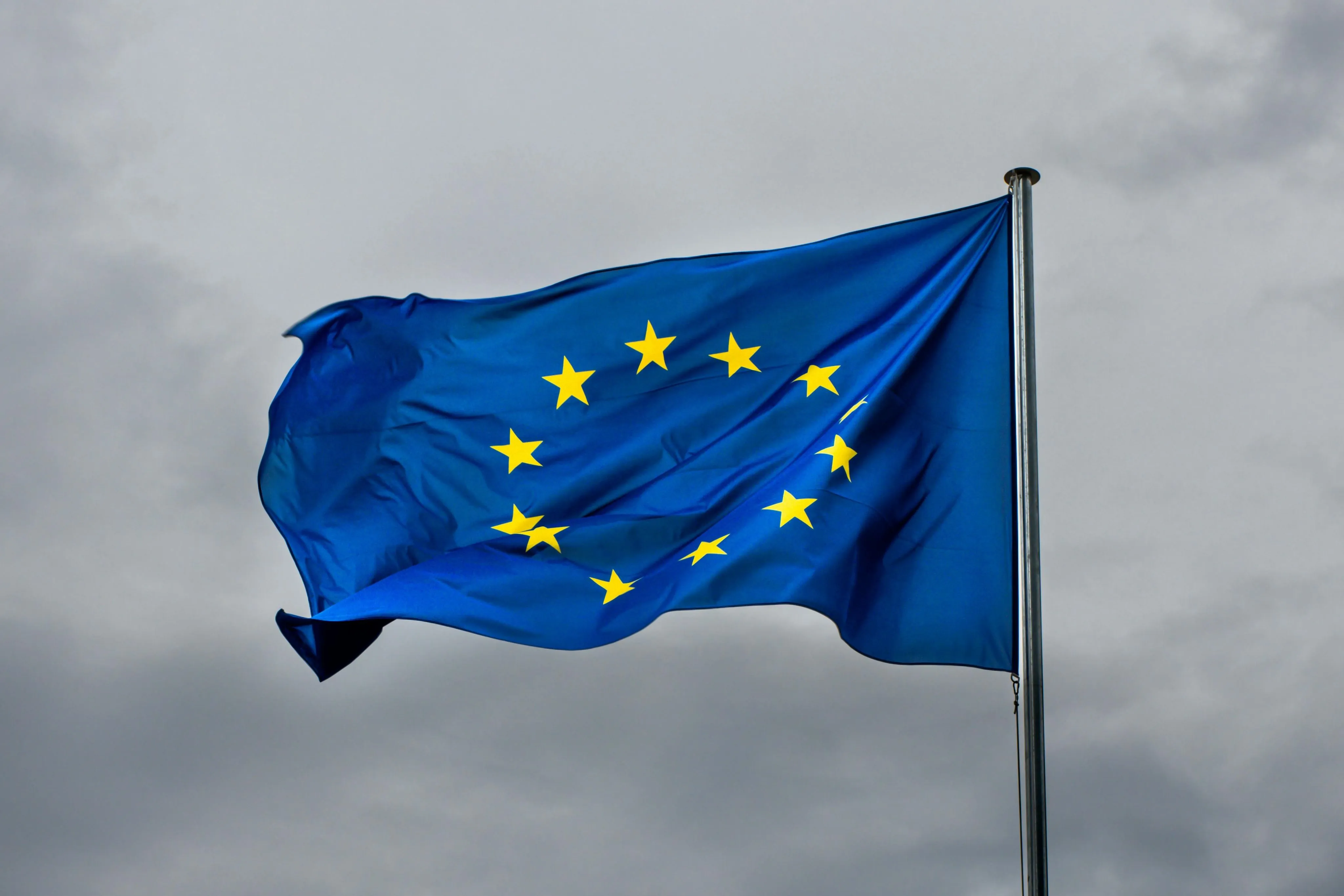 Comparisons In The Eurozone European Union flag waving